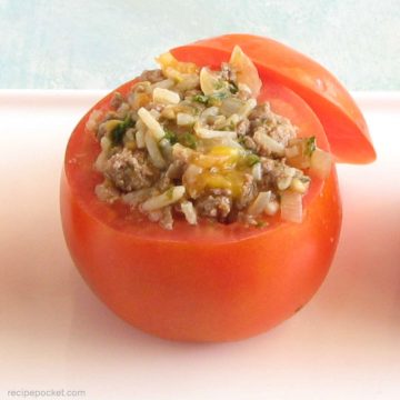A tomato stuffed with rice and meat.