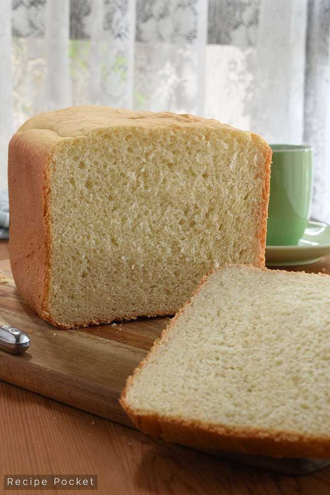 Close up of a loaf of white bread made in a bread maker.