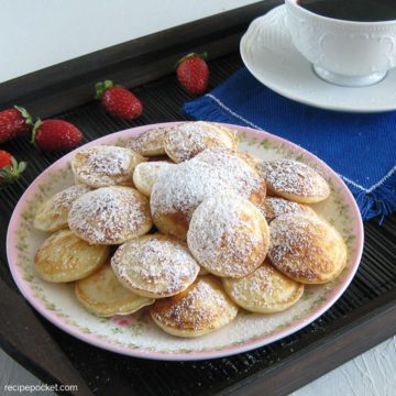Little Dutch pancakes on a plate.