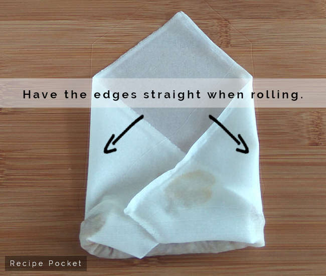 Keep edges of spring roll wrapper straight.