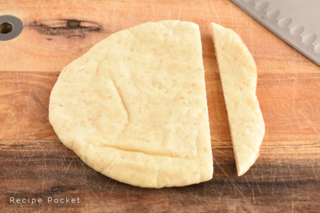 Image showing pita bread with a cut edge.