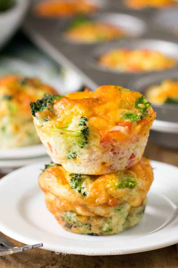 Two vegetable muffins stacked on top of one another.