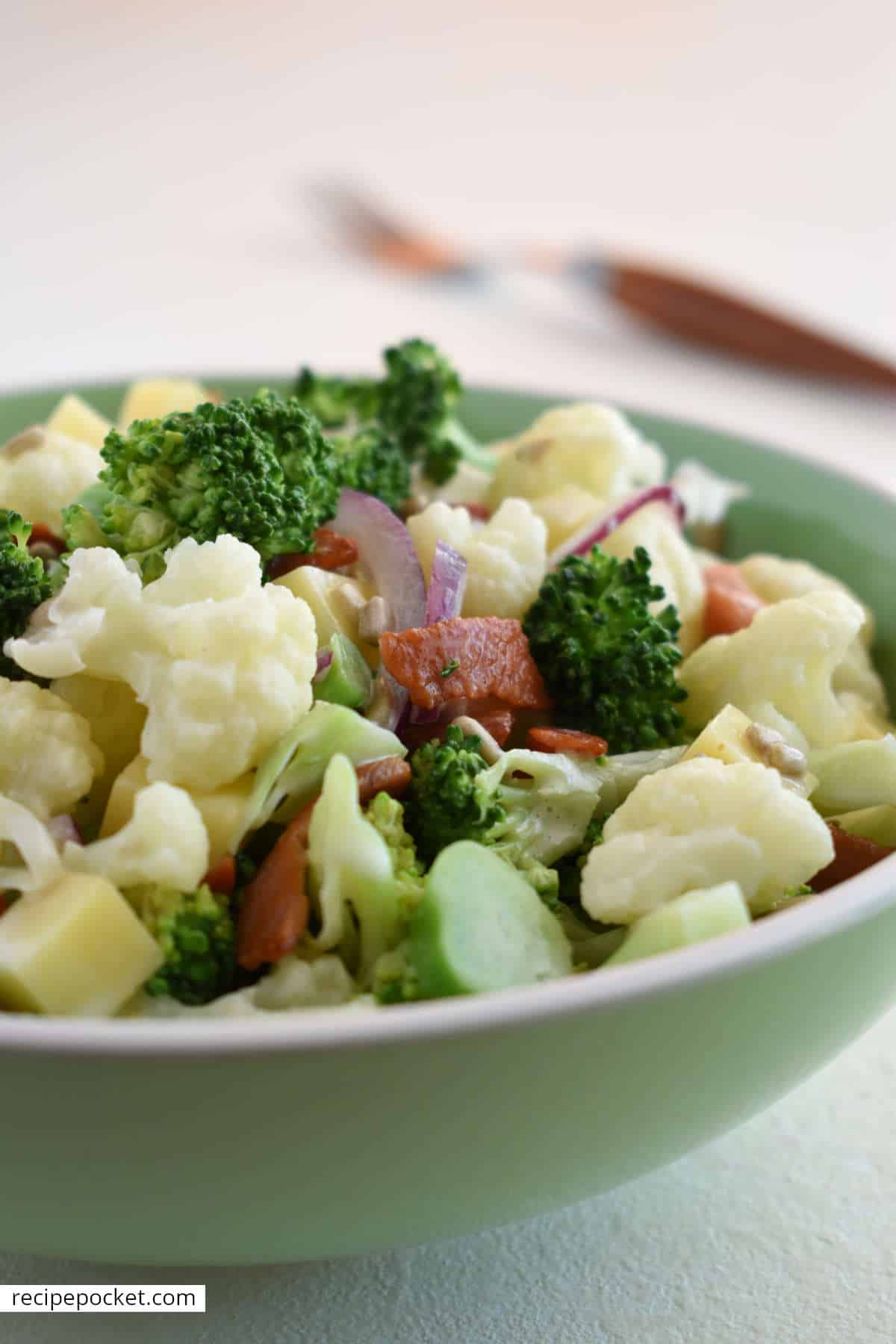 Closeup of broccoli and cauliflower salad.