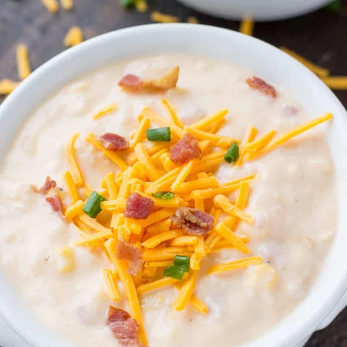 mage of thick and creamy potato soup with cheese.