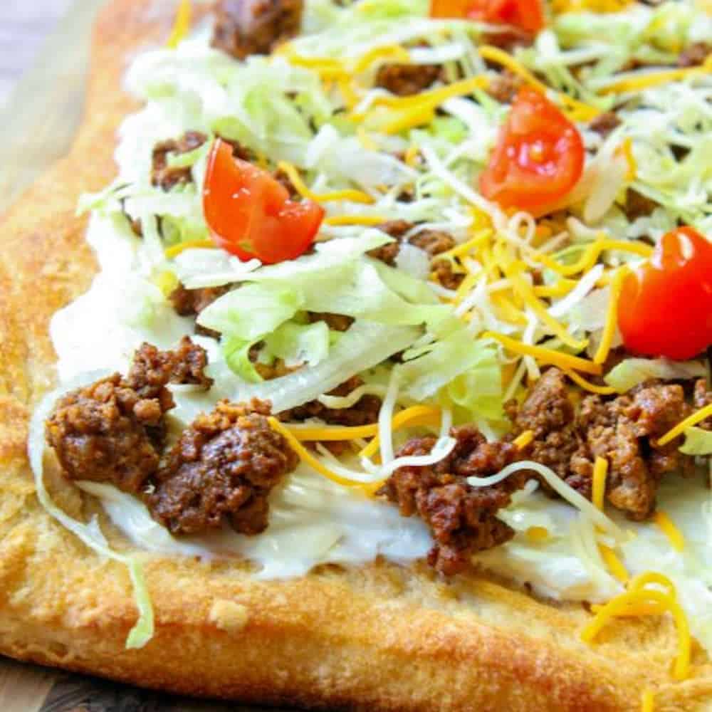 Pizza with a meaty taco topping.