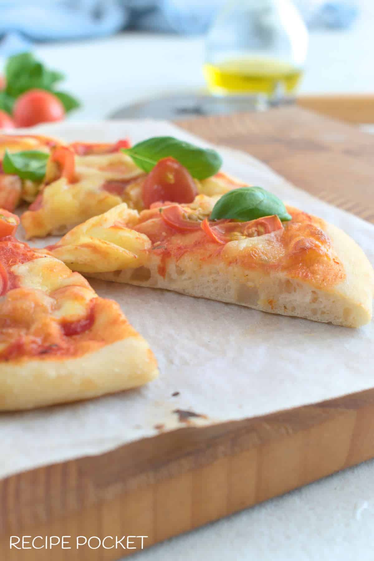 A close of a pizza made with this recipe for pizza dough.