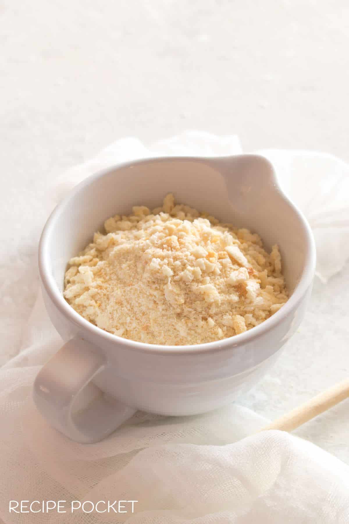 Main image for article on how to make breadcrumbs without a food processor. A jug with breadcrumbs.