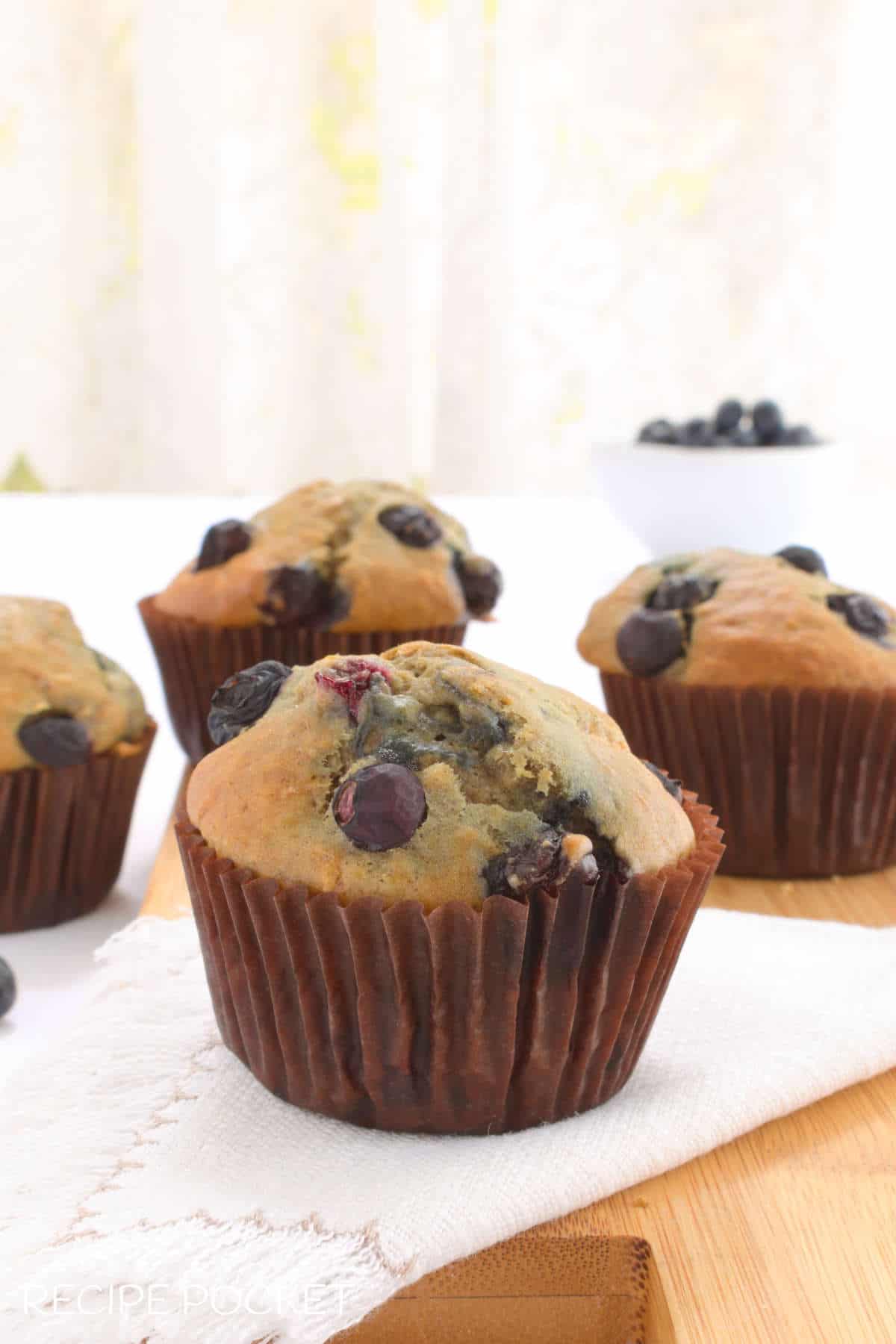 Blueberry muffins on a table.