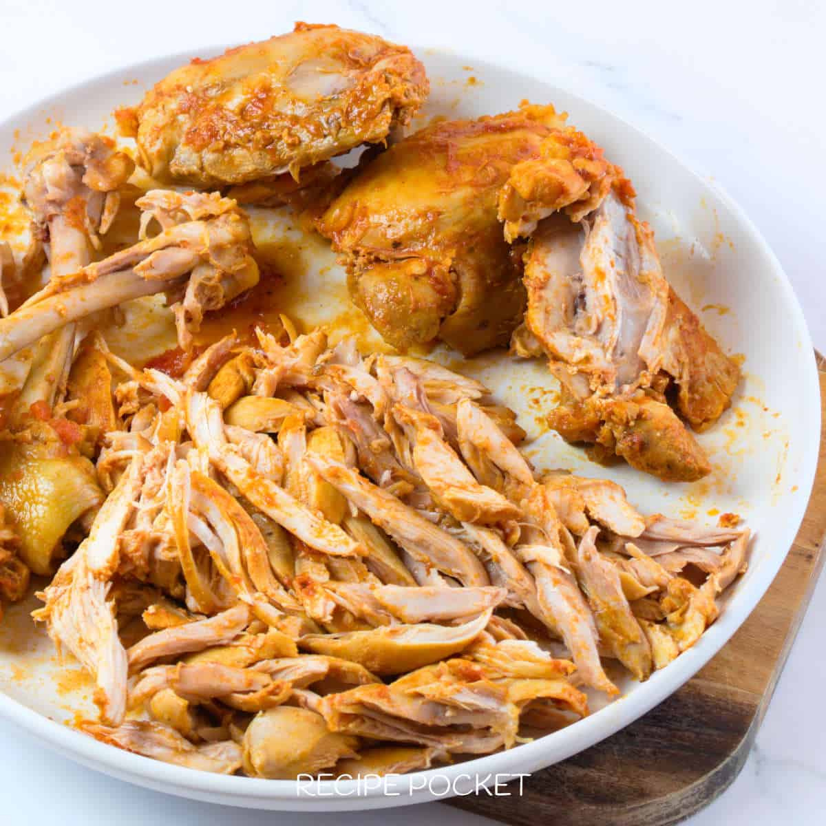 Shredded cooked chicken.