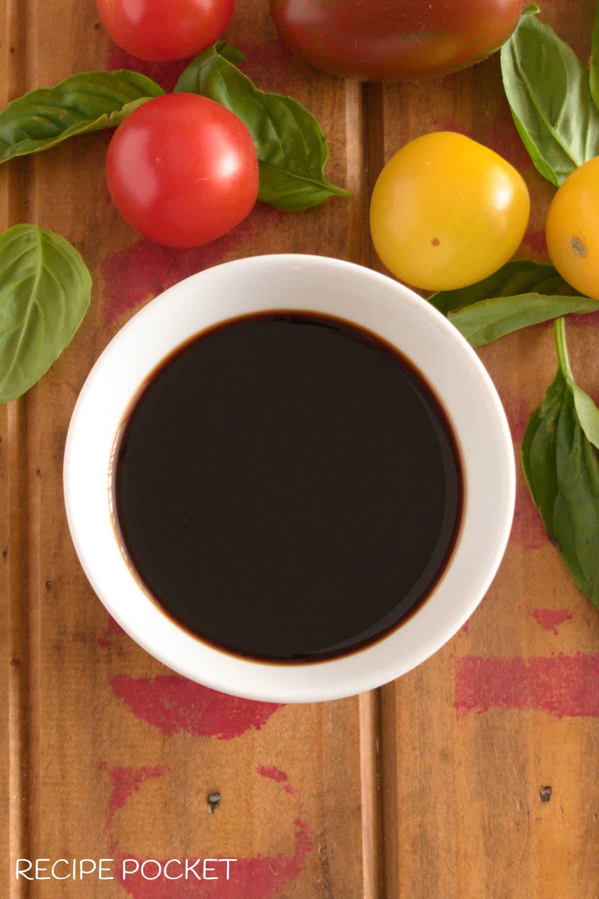 a top down view of balsamic vinegar in a bowl.