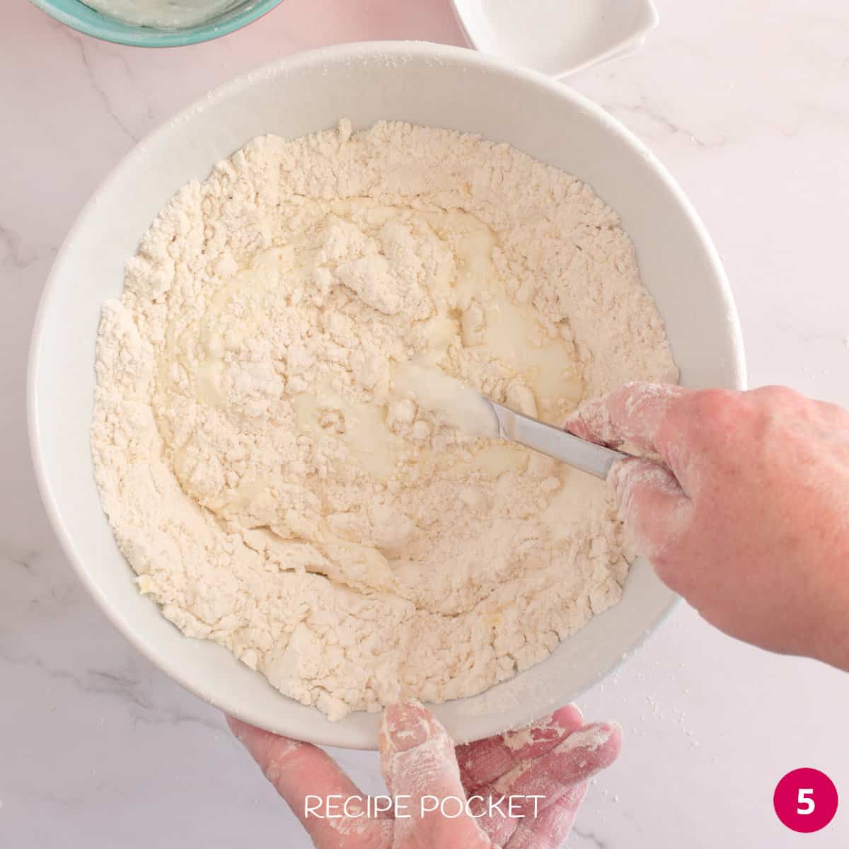 Mixing scone dough.