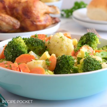 A closeup of buttered vegetables.