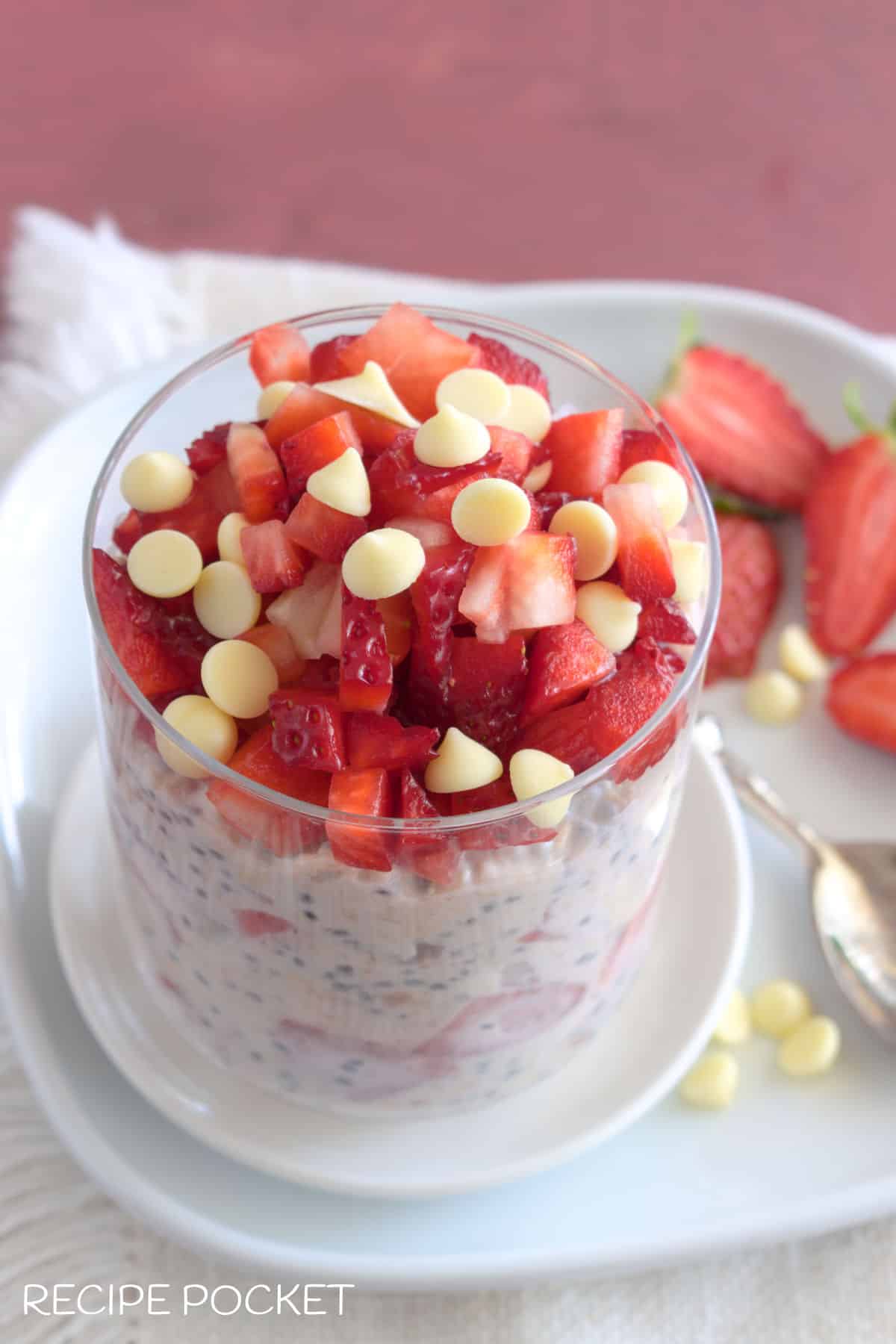Image showing a diced strawberry and white chocolate chip topping on oats.
