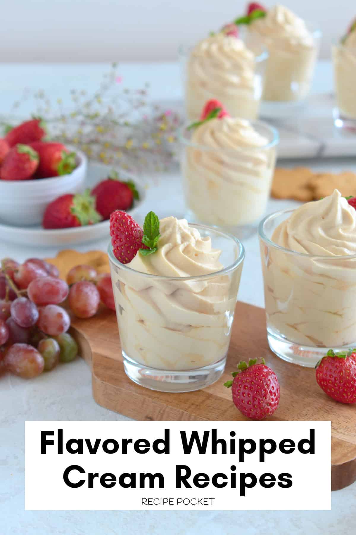 Small dessert glassed filled with flavored whipped cream.