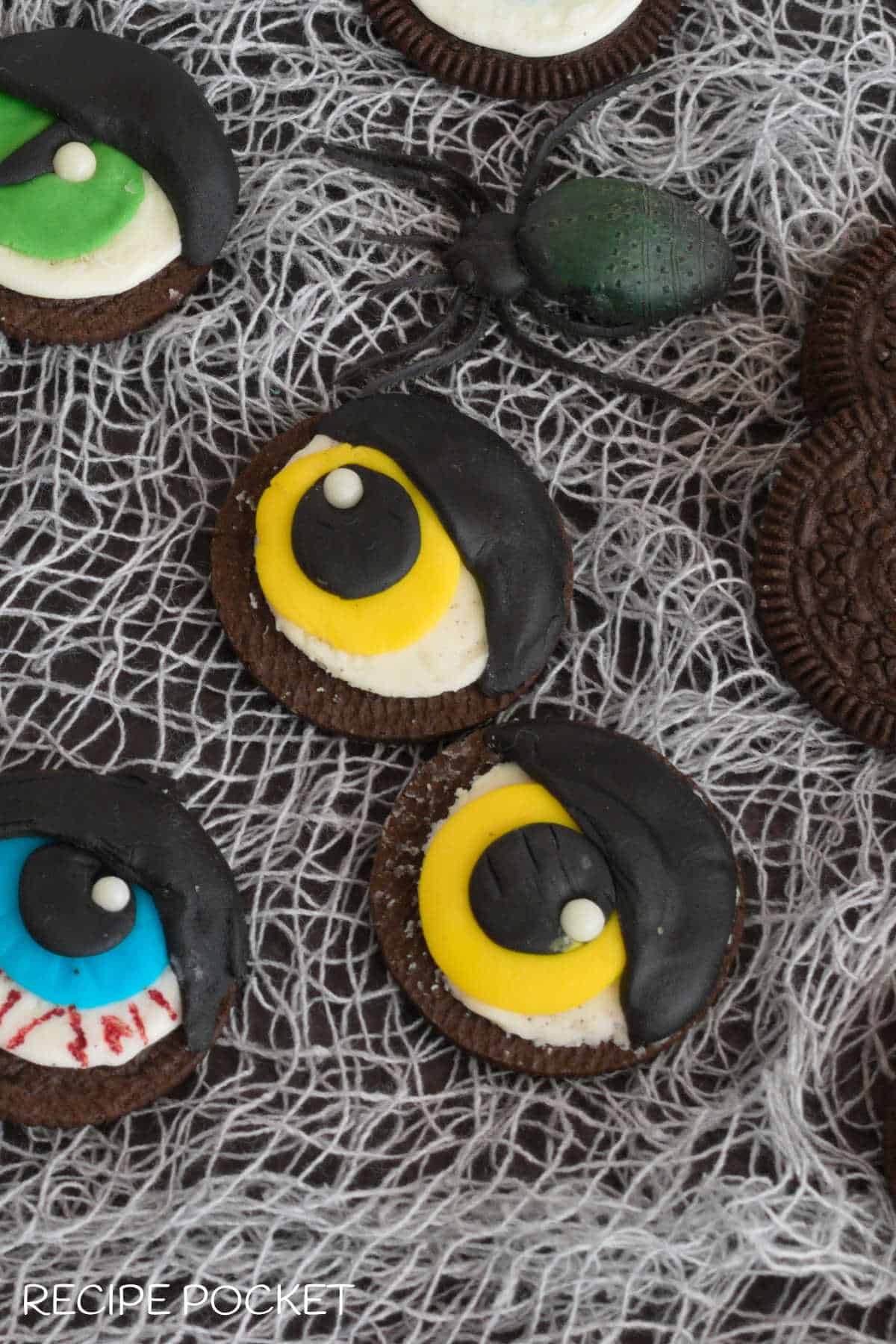Yellow oreo eyeball cookies.