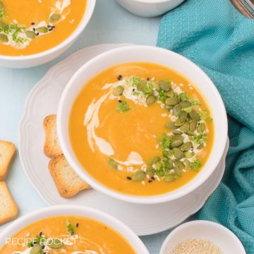 A bowl of homemade pumpkin and sweet potato soup.