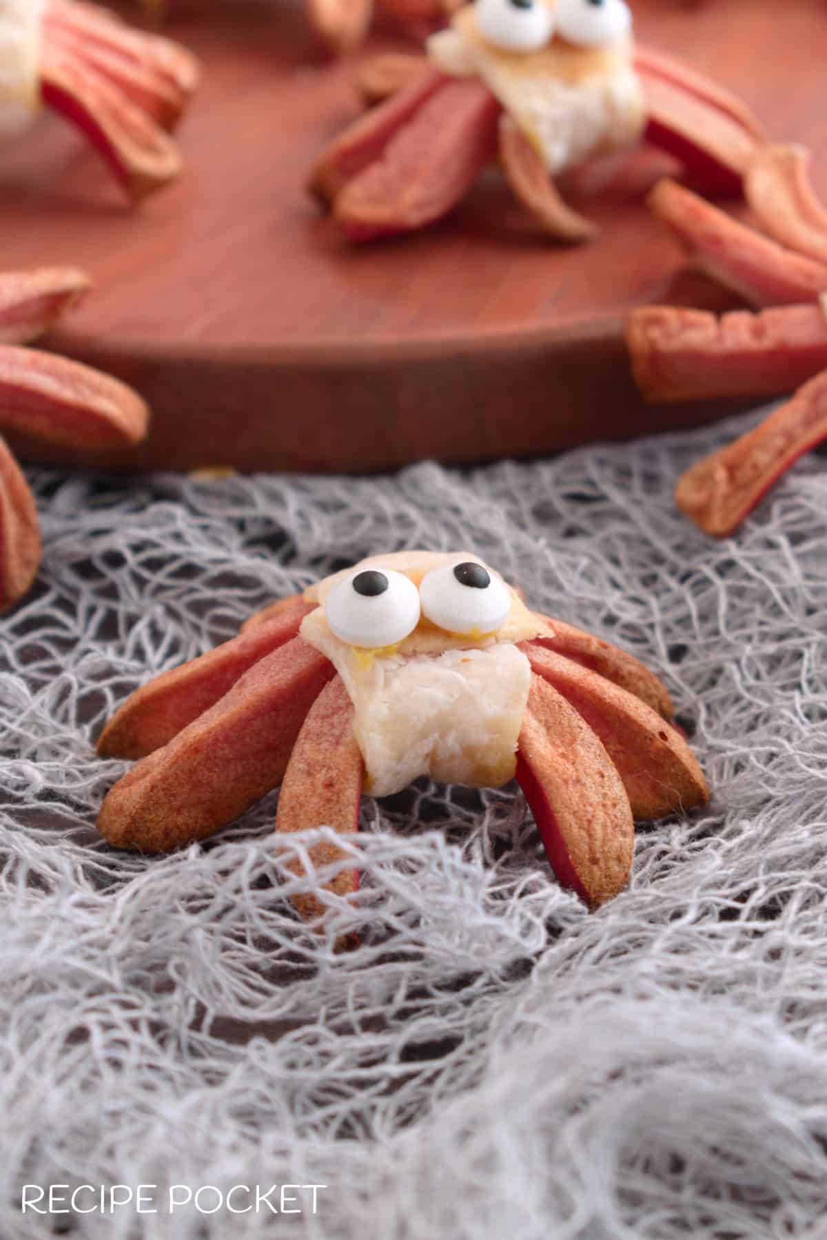 A close up of an easy Halloween snack spider hot dogs.