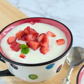 A close up of homemade yogurt in a cup.